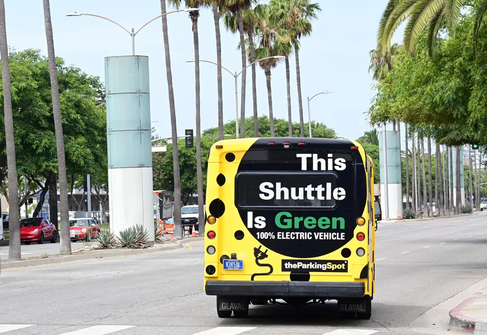 view of The Parking Spot all electric shuttle rear, transporting airport passengers from their car to their terminal in Los Angeles