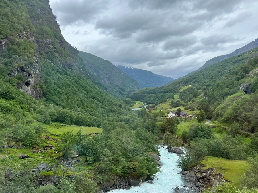 A mountain stream flows through the center of Norway's Flam Valley. Photo by the author.