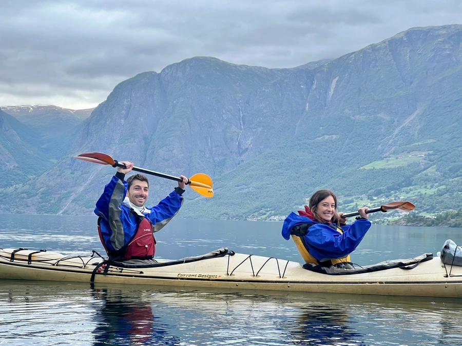 Carolina and Griffin in a two seat kayak in Aurlandsfjord.