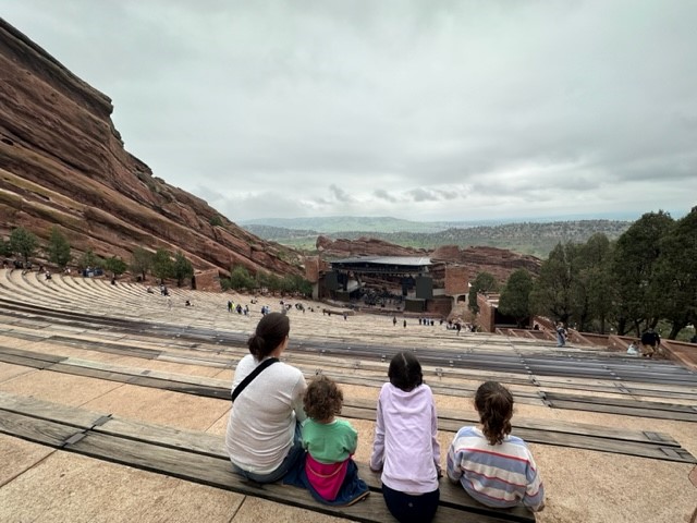The Habers rest briefly in the amphitheater at Red Rocks