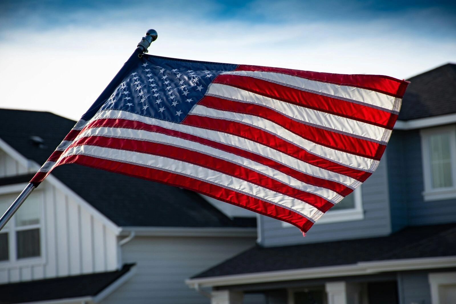 American flag outside of homes