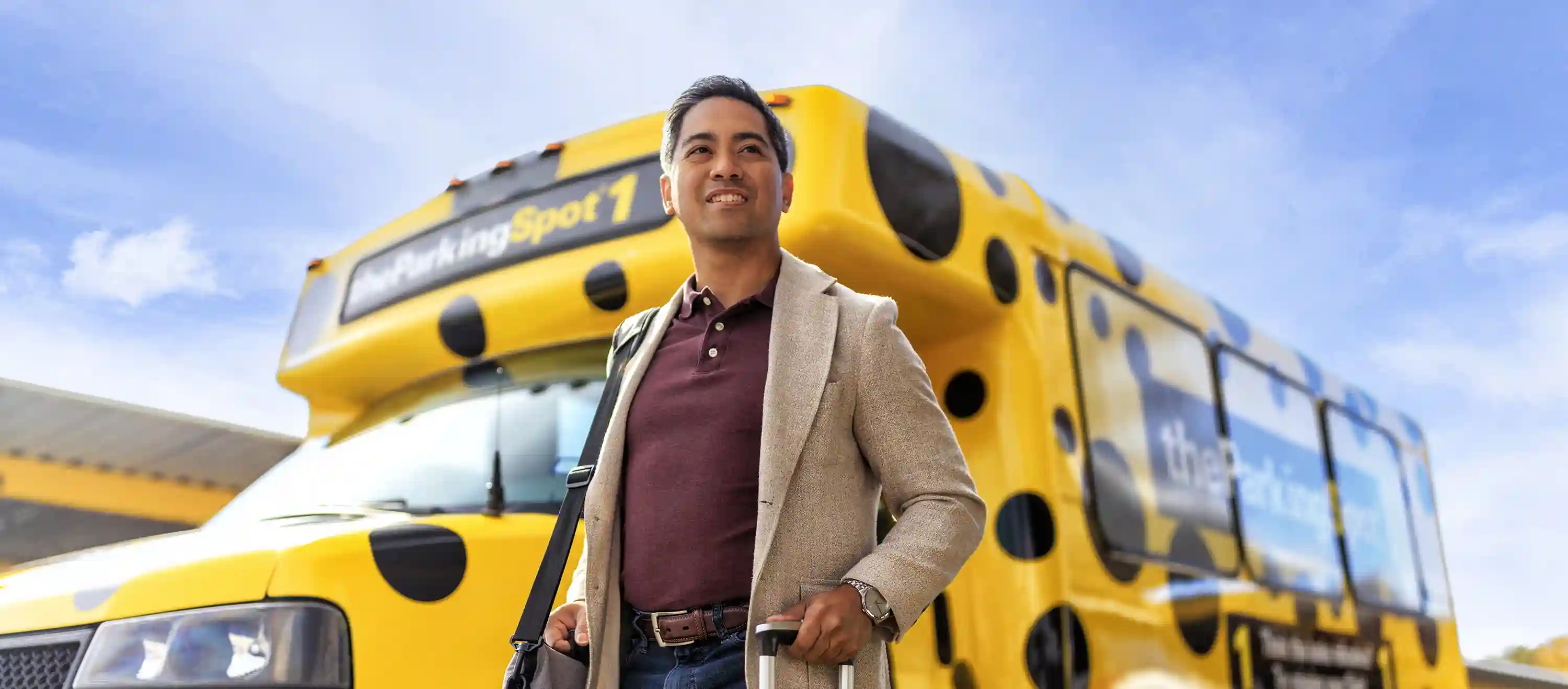 Guests of The Parking Spot depart the shuttle after a seamless airport parking experience.